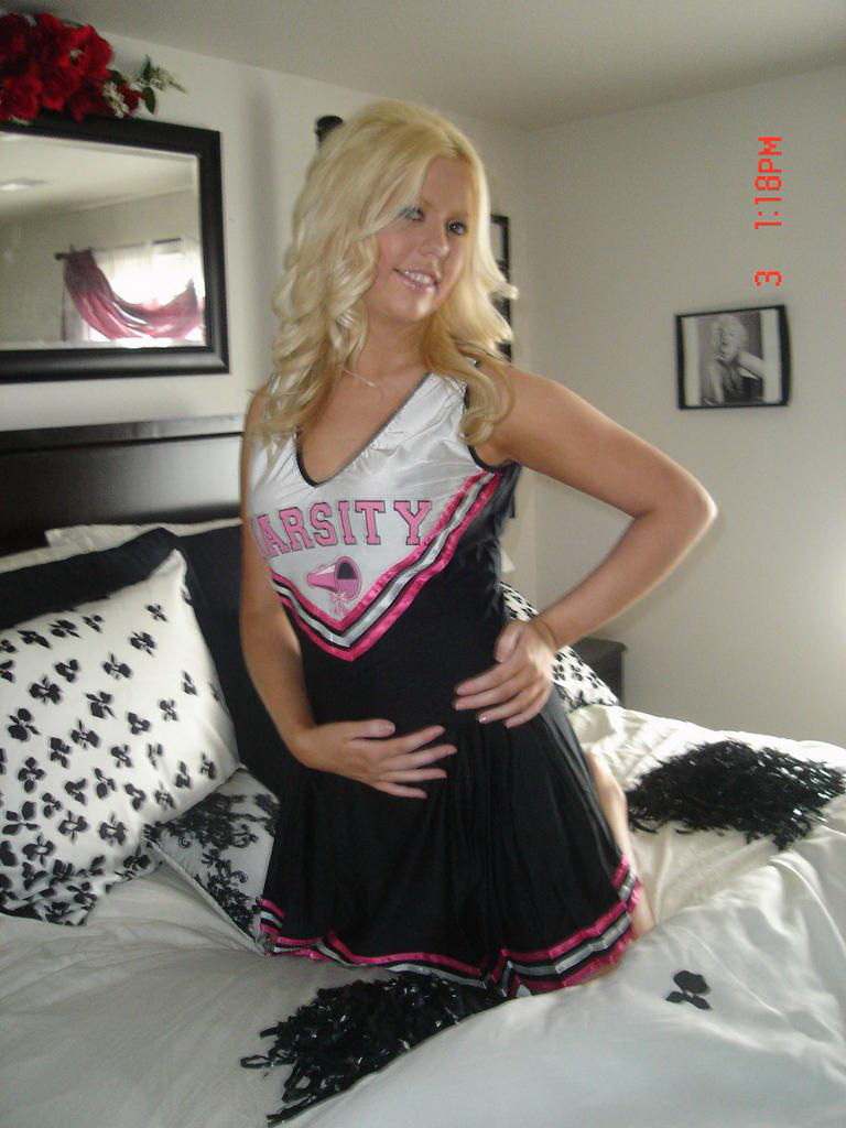 Blonde cheerleader posing and masturbating — 34